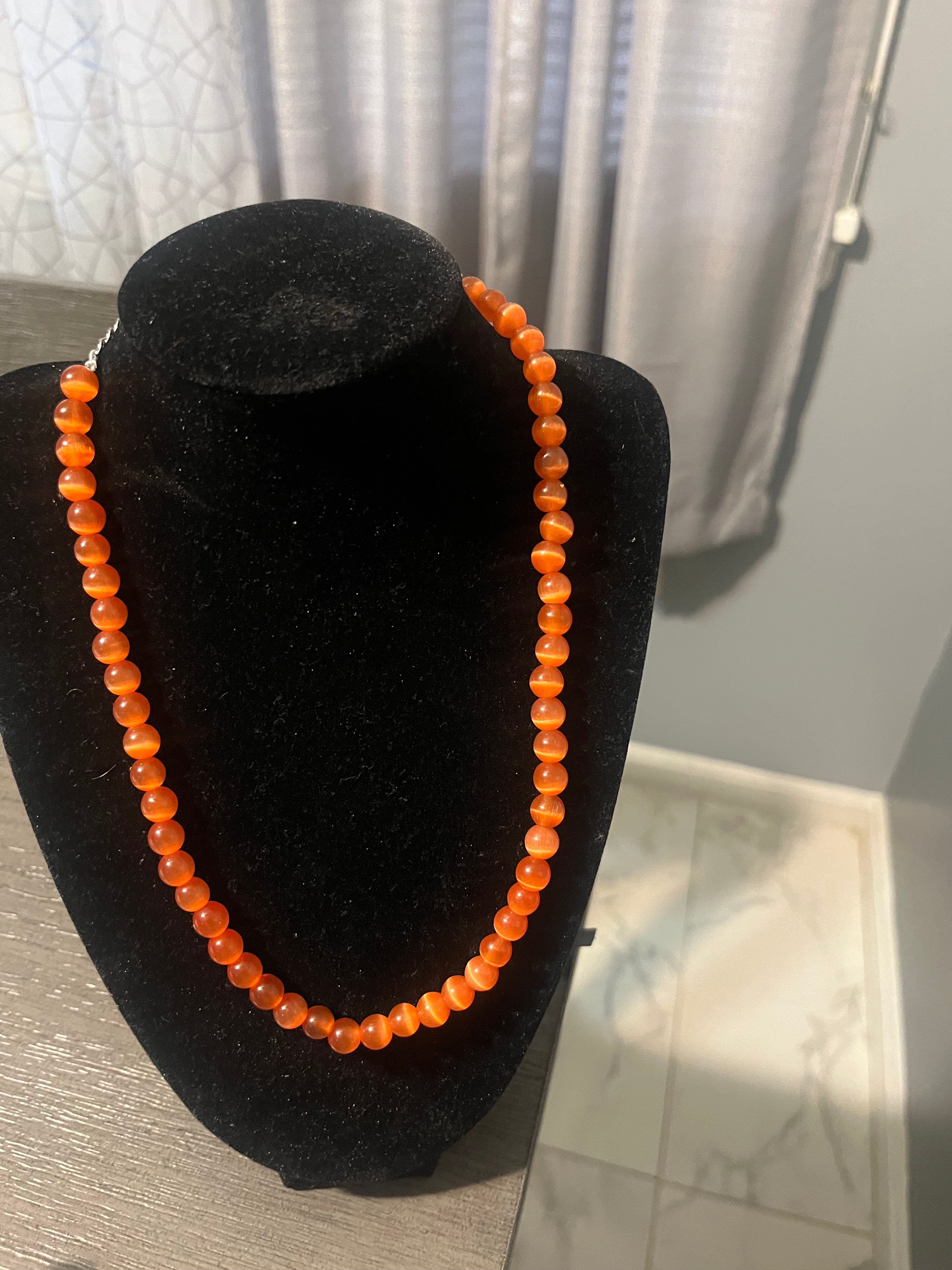 Orange cat eye  necklace