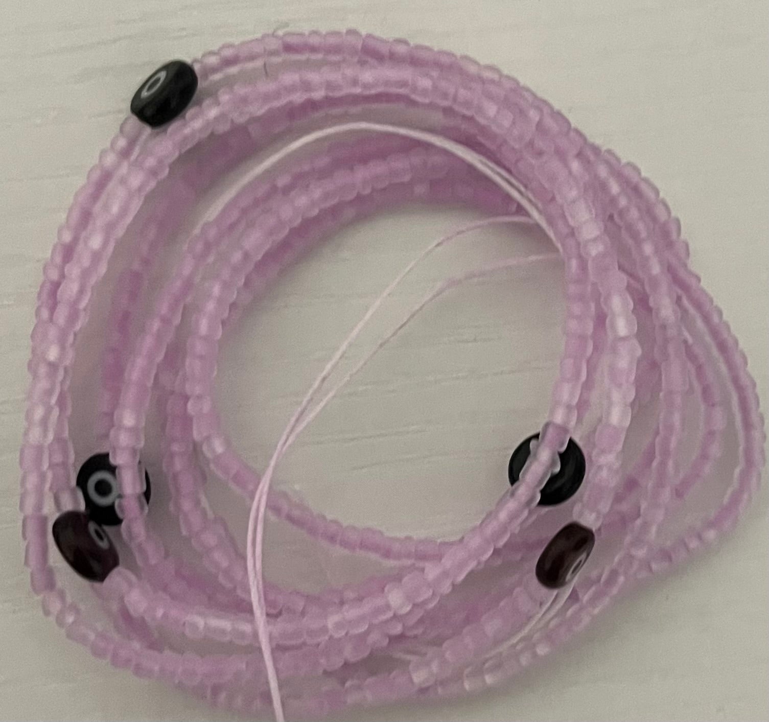 Purple evil eye  50 inch tie on waist bead