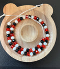 Red black and white tie on anklet 12 inches
