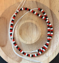 Red black and white tie on anklet 10 in half inches