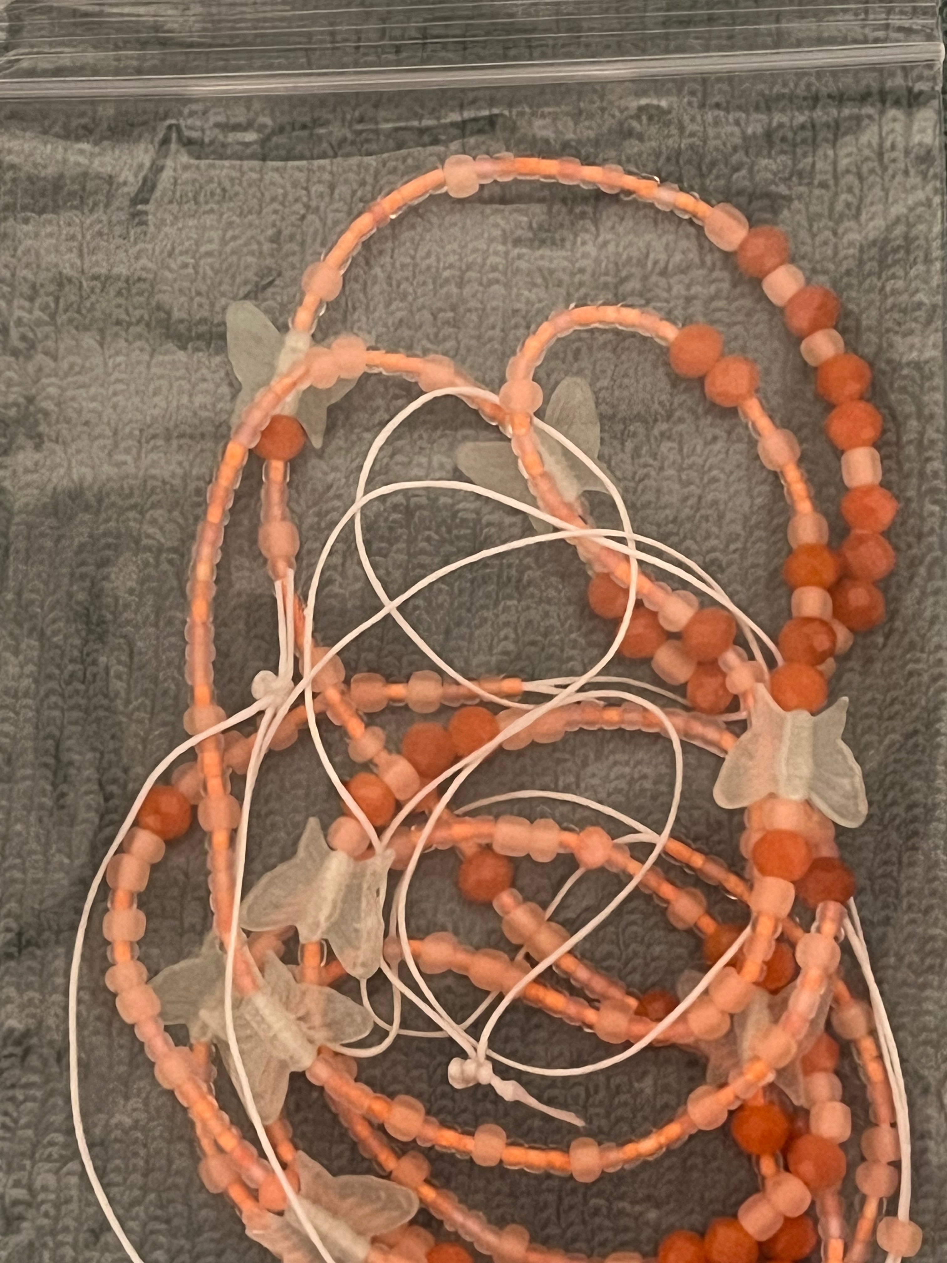 Different shades of orange 50 inches tie on waist bead