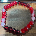 Different shades of red bracelet