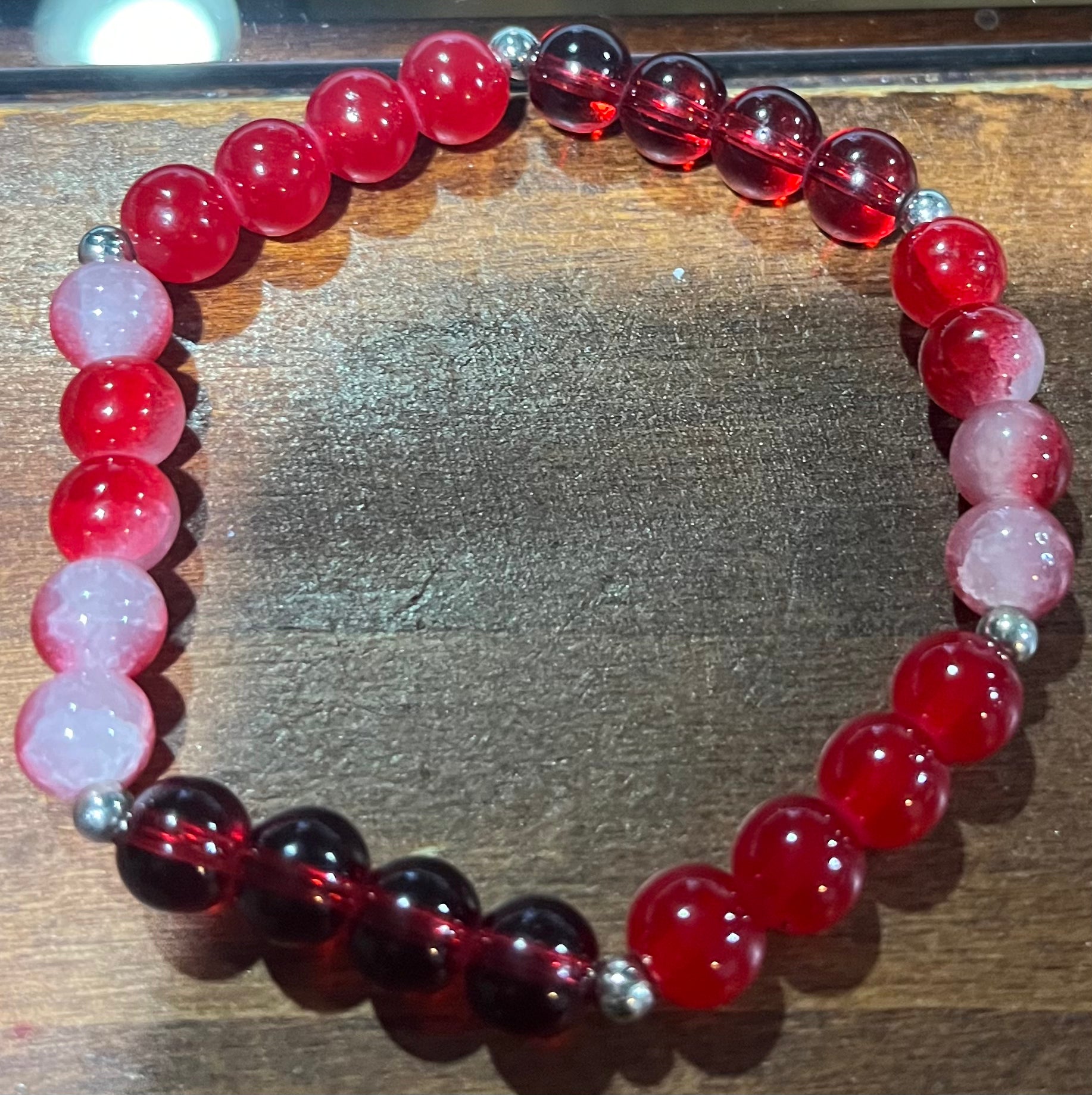 Different shades of red bracelet