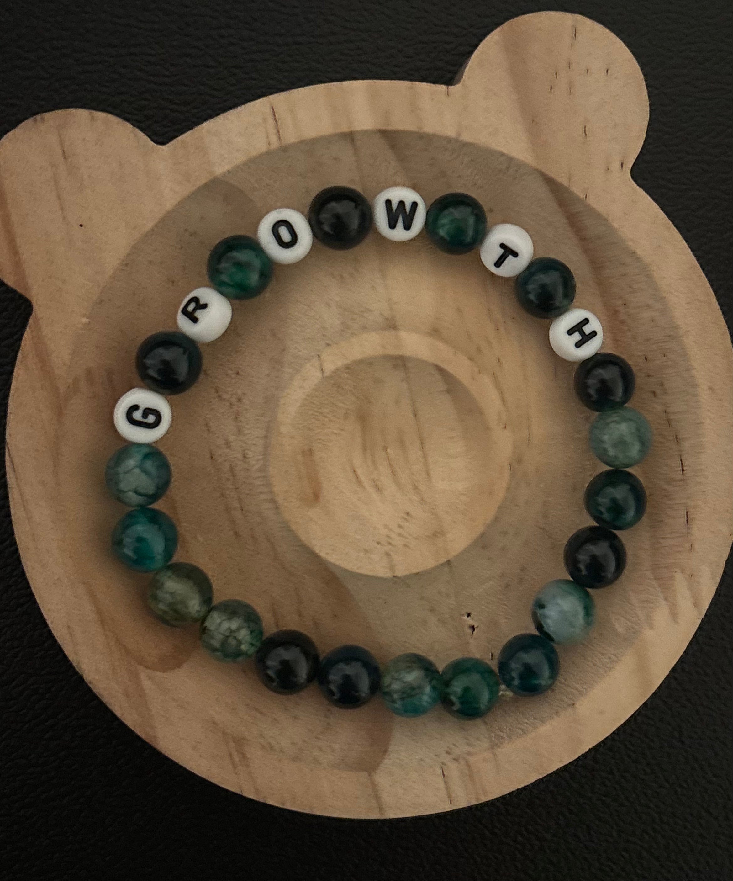 Bracelet with the word growth