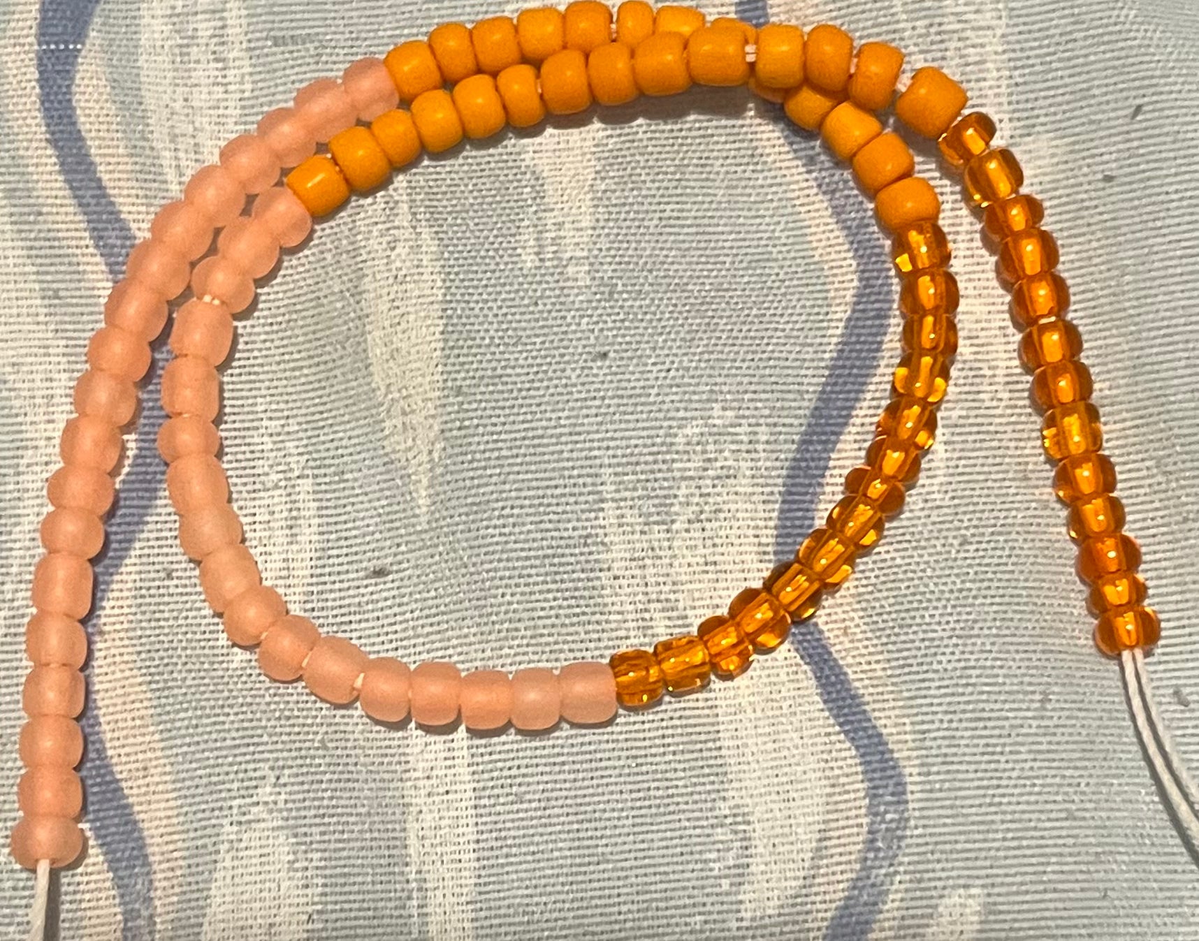 Different shades of orange size 12 inches tie on