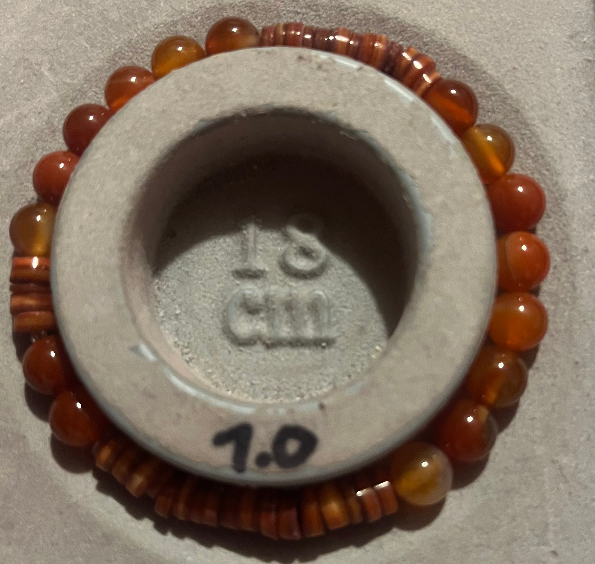 reddish orange bracelet
