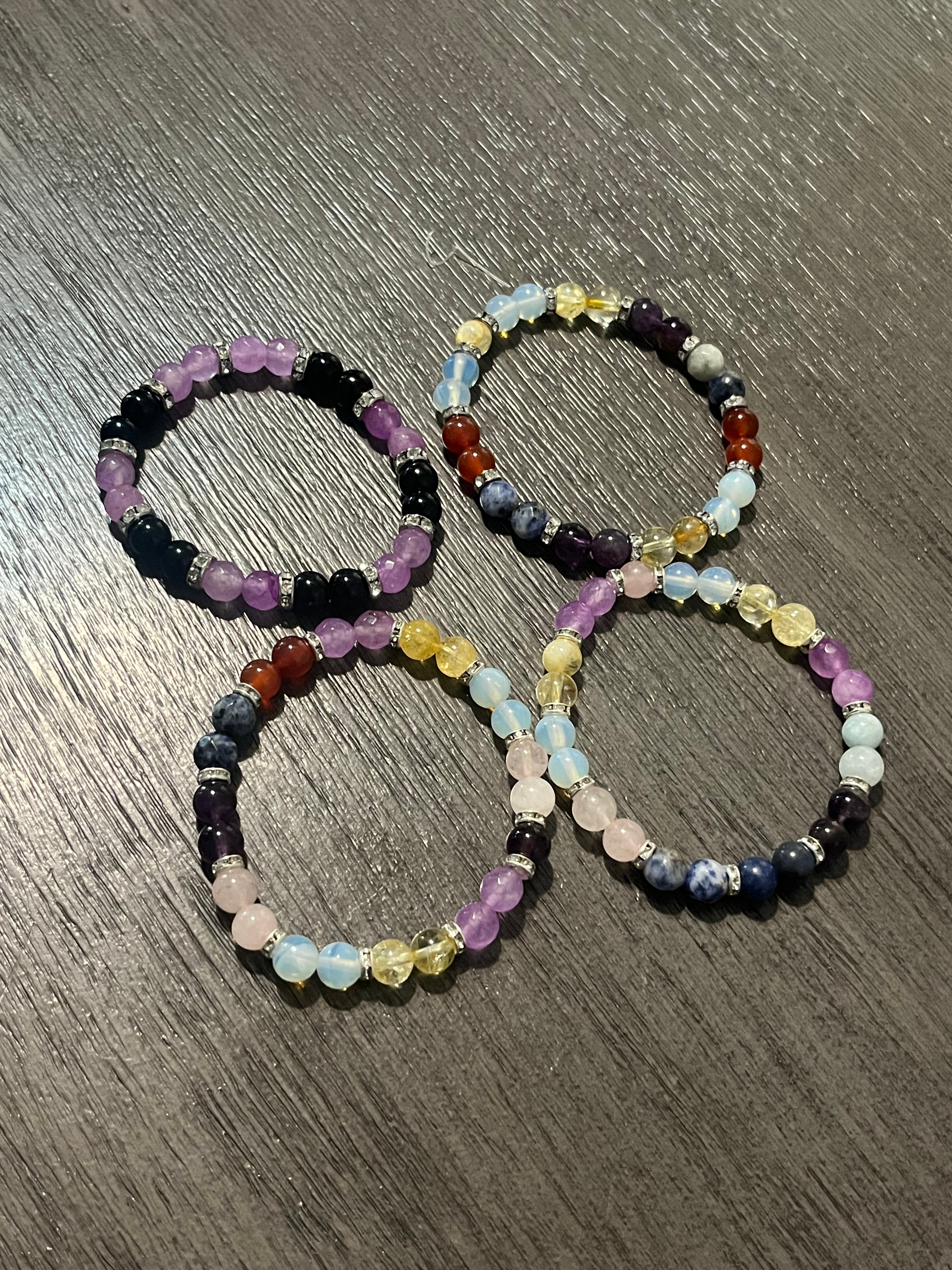 Different type of stone bracelets with small beads