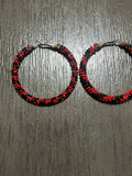 Large red and black hoop earrings